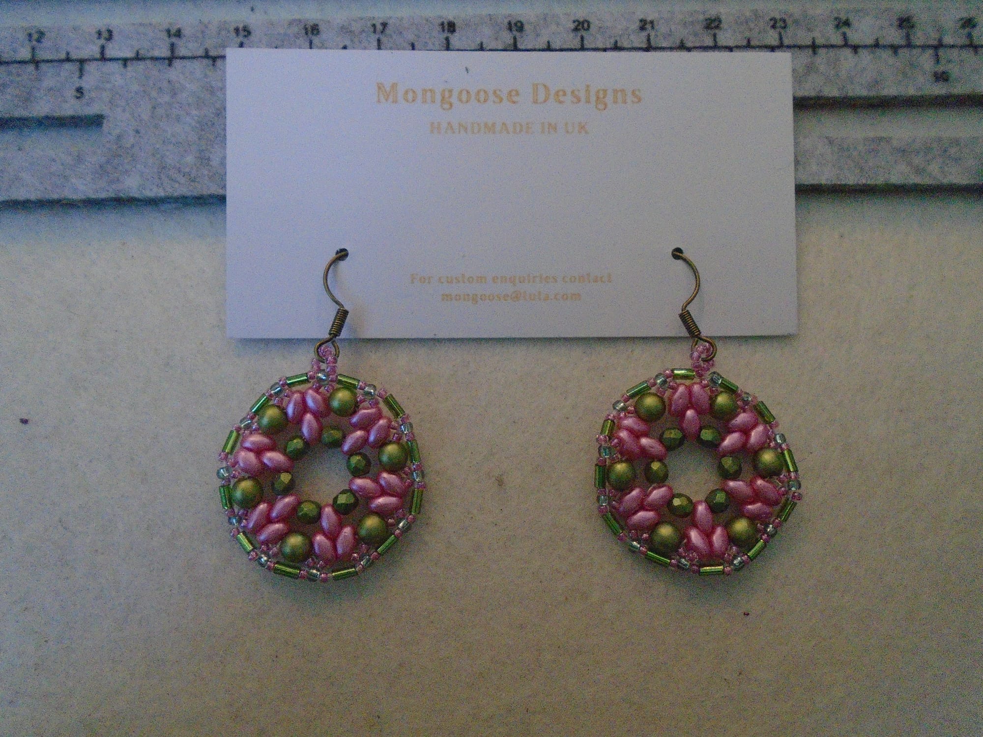 This pair is a rather sugary pink (Miniduos and tiny seeds) and olive green (everything else).