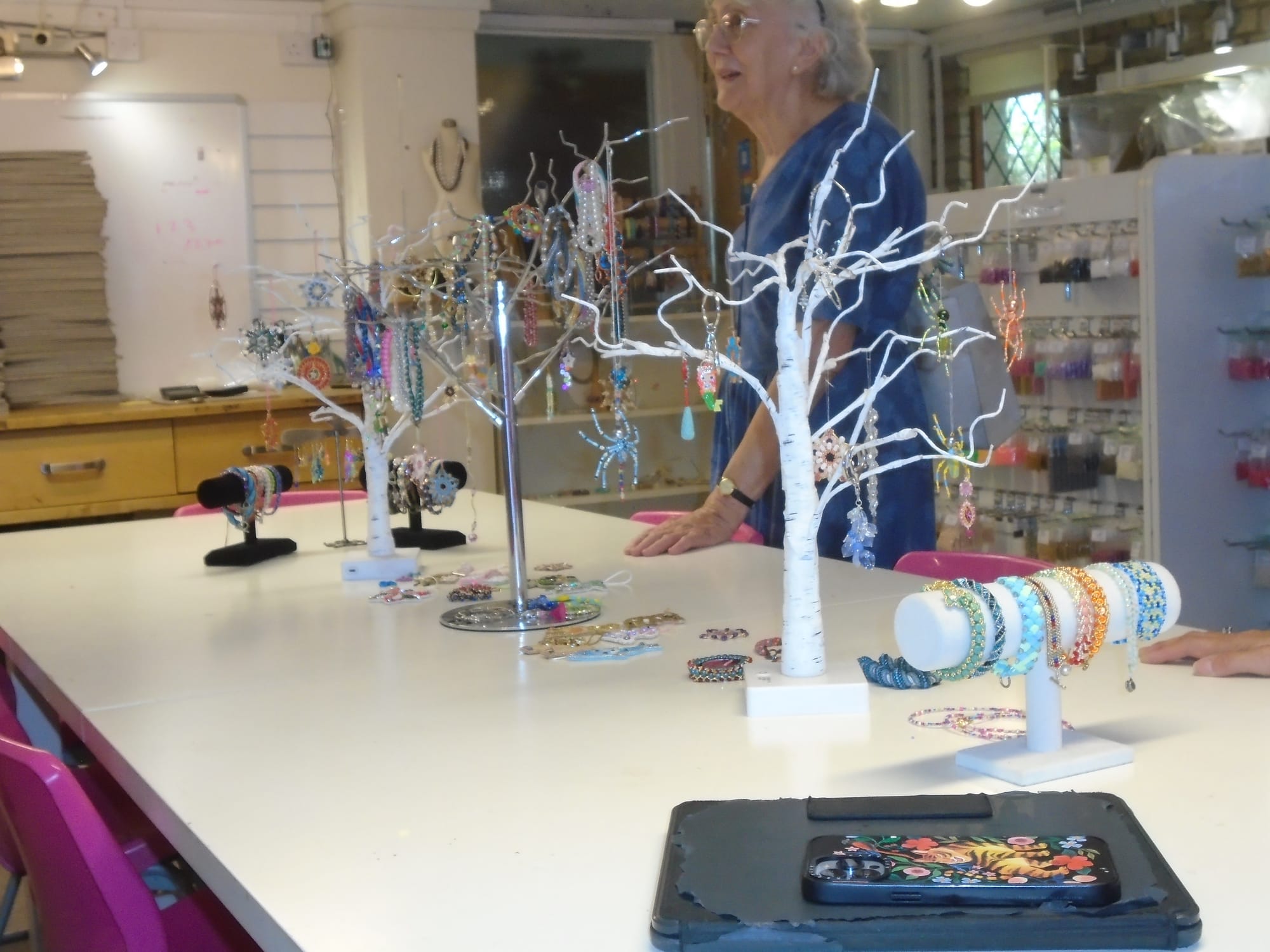 An angled view of the same table; it's a lot clearer in this one that some of the decorations are large spiders!