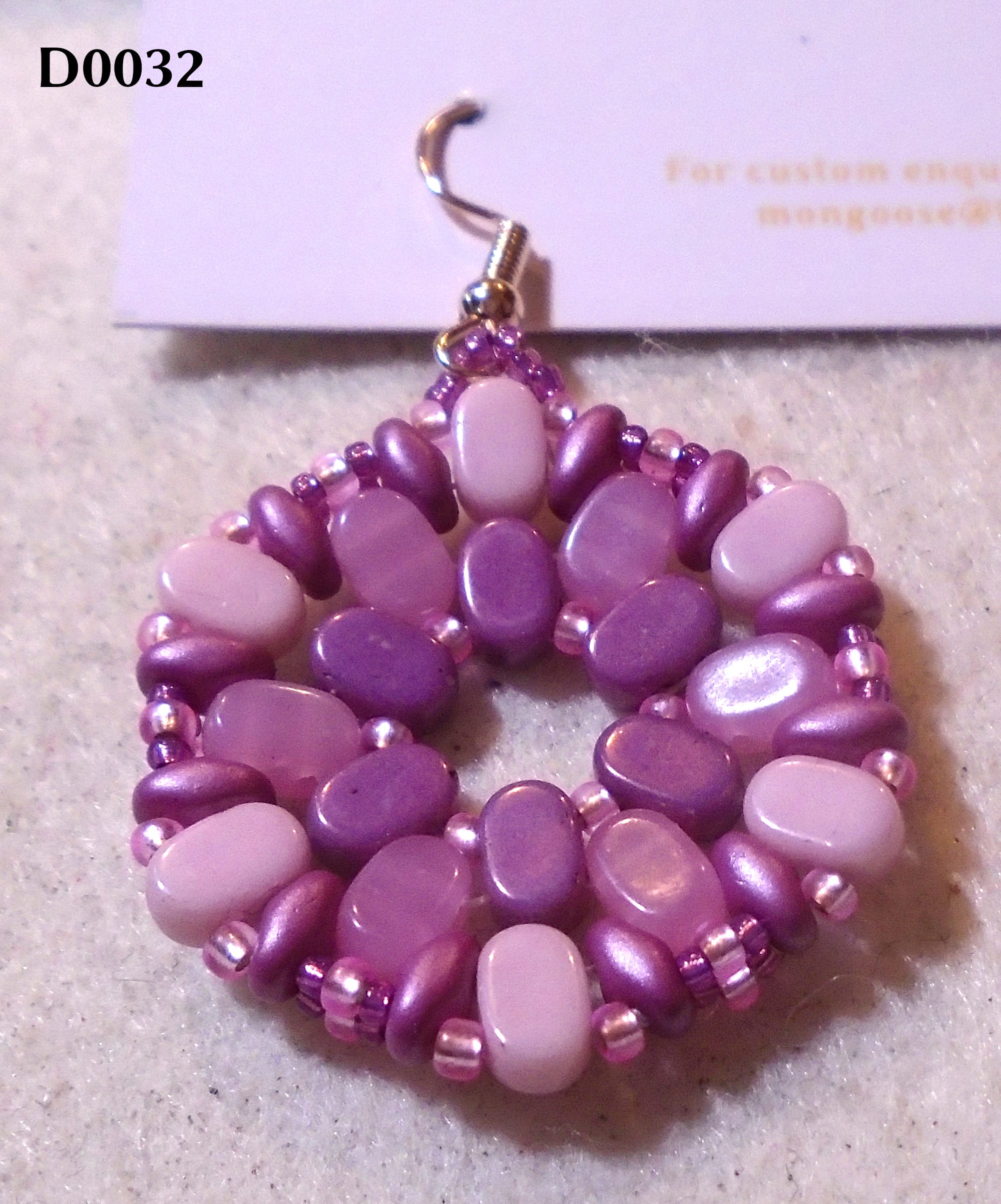 Another hexagonal earring, this one in toning shades from mid-purple through to pale pink.