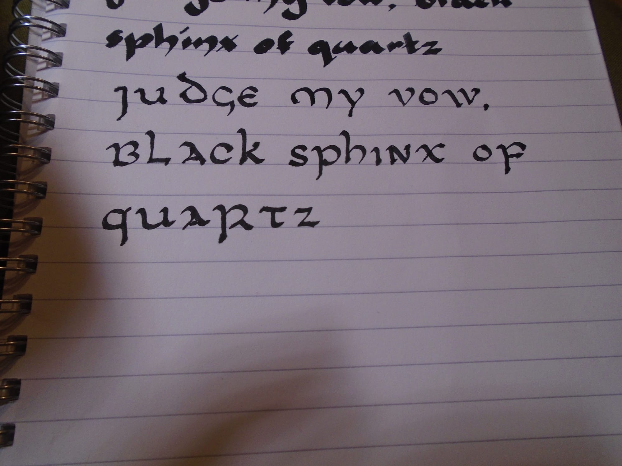 The same sentence written in a somewhat shaky uncial hand.  I don't have a time period for this.