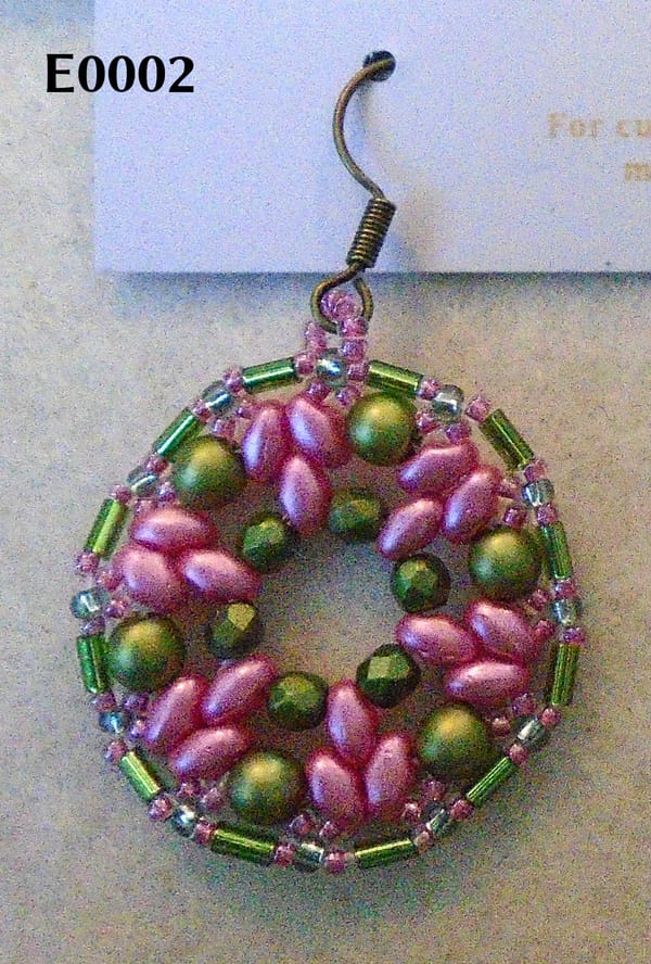 Rose pink and olive green 1920s-style earring on antique bronze earwire.  The photo is labelled "E0002".